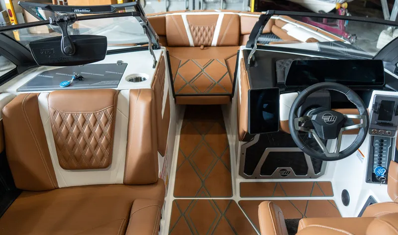 Slide: The Image of Interior of 2026 Malibu M230 with luxurious leather seating. - 5