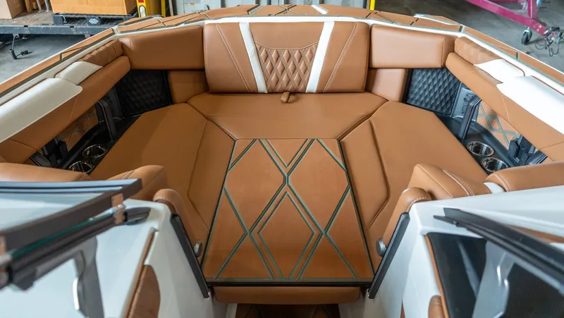 Slide: The Image of Luxurious interior of the 2026 Malibu M230 boat. - 6