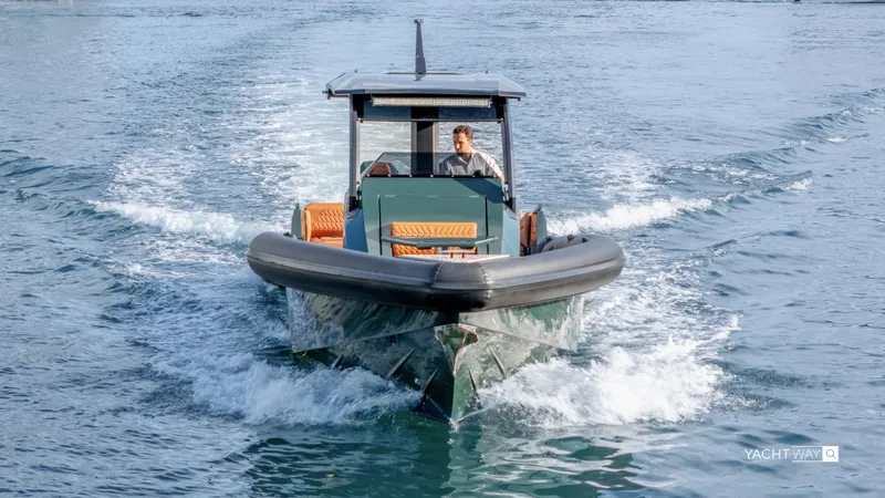 Slide: The Image of 2025 Skipper-BSK 38 boat cruising on open water, showcasing sleek design and performance. - 19