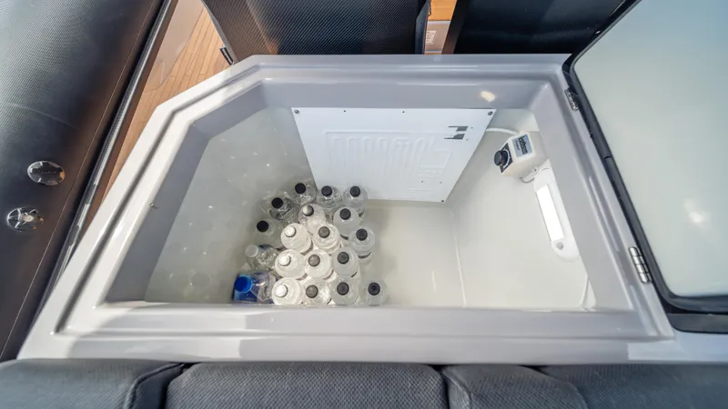 Slide: The Image of Built-in cooler with bottled drinks on Skipper-BSK 38, 2025 model. - 31