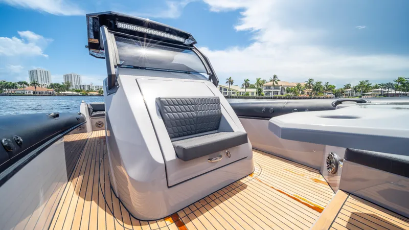 Slide: The Image of 2025 Skipper-BSK 38 luxury boat with sleek design and modern seating on deck. - 2