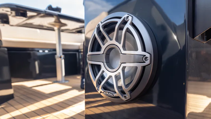 Slide: The Image of Close-up of a speaker on a 2025 Skipper 38 boat deck. - 28