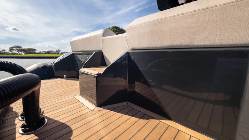 Slide: The Image of 2025 Skipper 38 boat deck with sleek design and wooden flooring. - 28