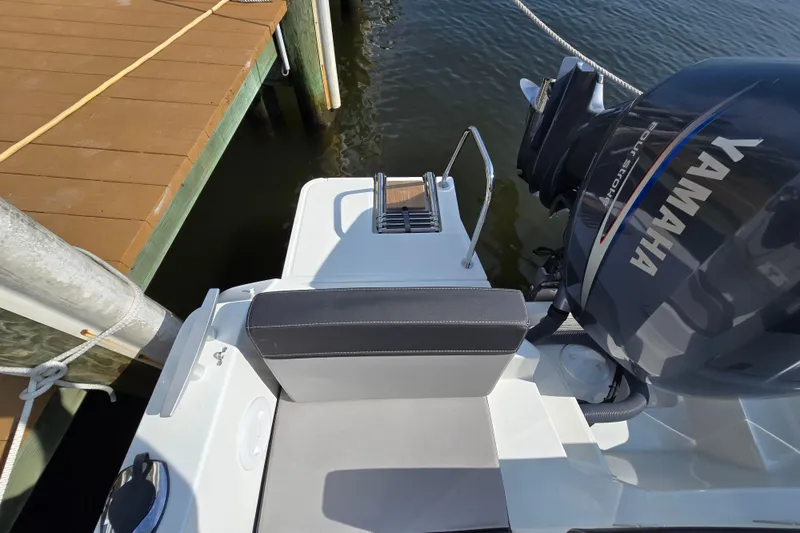 Slide: The Image of 2023 Jeanneau NC Sport 795 Series 2 boat with Yamaha engine at dock. - 12