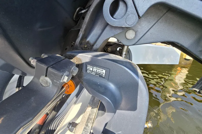 Slide: The Image of Close-up of a 2023 Jeanneau NC Sport 795 Series 2 boat engine component. - 14