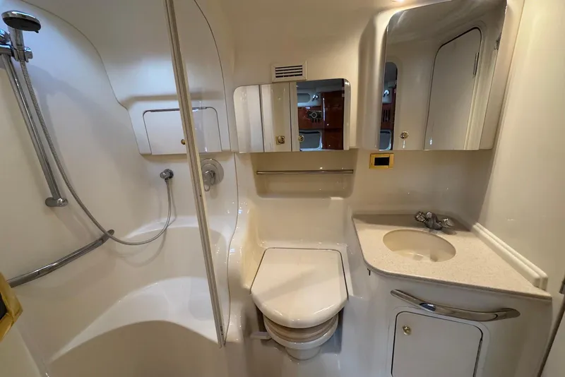 Slide: The Image of Luxurious bathroom in 2000 Sea Ray 410 Sundancer yacht with shower and vanity. - 19