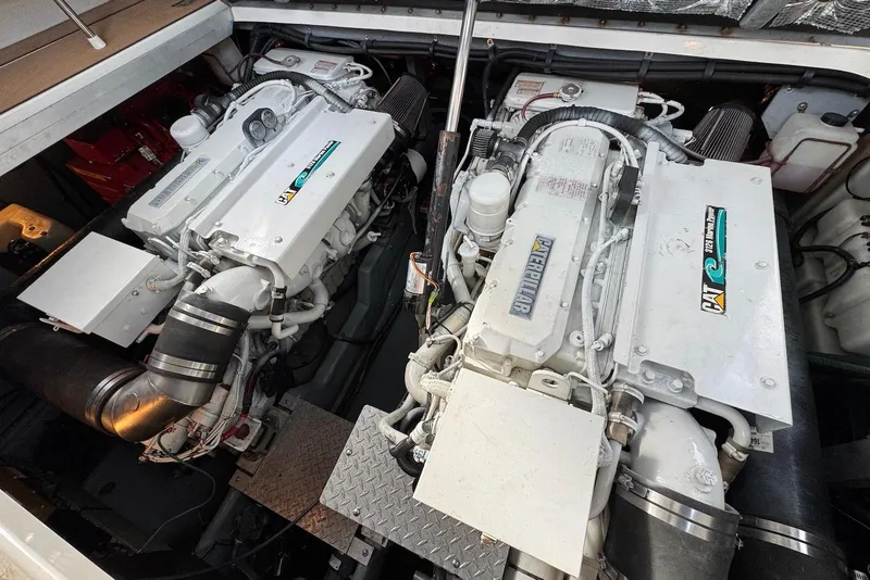 Slide: The Image of Engine compartment of a 2000 Sea Ray 410 Sundancer with twin Caterpillar engines. - 23