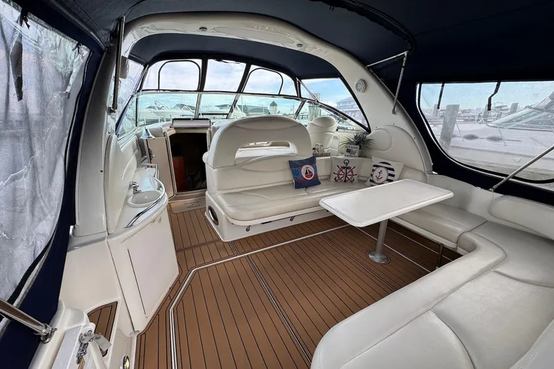 Slide: The Image of Luxurious interior of a 2000 Sea Ray 410 Sundancer yacht with elegant seating and decor. - 3