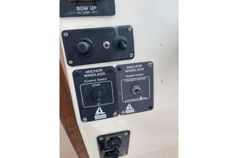 Slide: The Image of Control panel of a 2001 Parker 2520 Sport Cabin boat with anchor windlass switches. - 7
