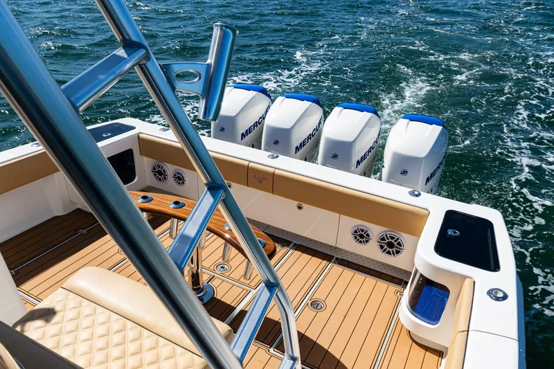 Slide: The Image of 2016 SeaVee 430 boat with quad Mercury engines on open water. - 61