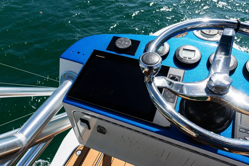 Slide: The Image of Steering console of 2016 SeaVee 430 boat with modern navigation equipment. - 72