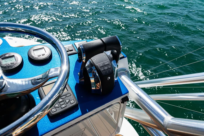 Slide: The Image of Control panel of a 2016 SeaVee 430 boat with ocean view. - 80
