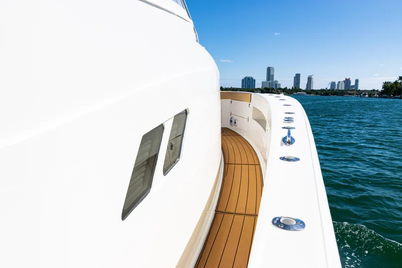 Slide: The Image of 2016 SeaVee 430 yacht cruising near city skyline on a sunny day. - 90