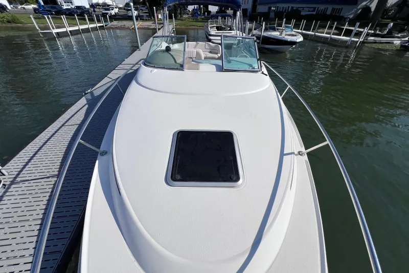 Slide: The Image of 1996 Chaparral 196 SSi boat docked at marina, viewed from bow. - 10