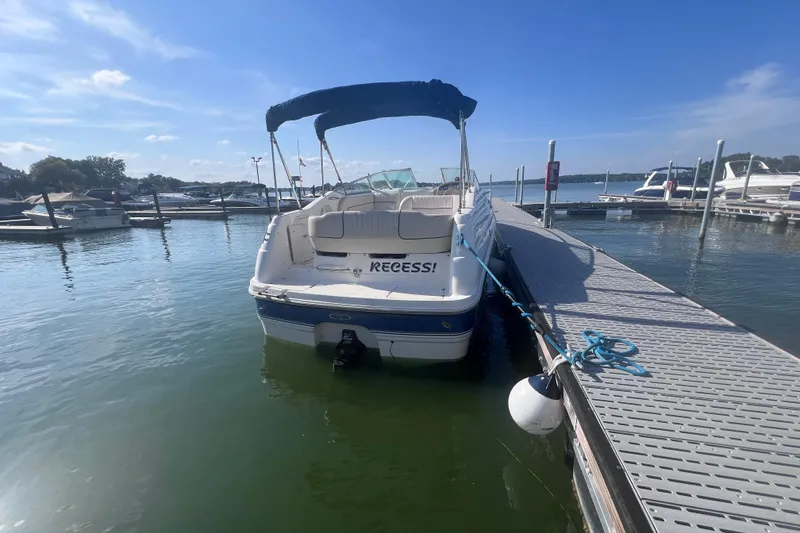 Slide: The Image of Chaparral 196 SSi 1996 boat docked at marina under clear blue sky. - 13