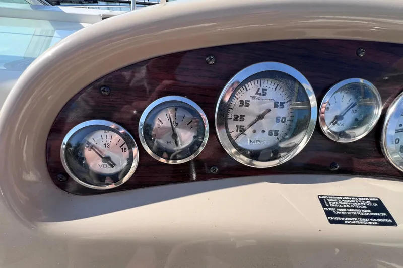 Slide: The Image of Dashboard of a 1996 Chaparral 196 SSi boat with gauges and controls. - 20