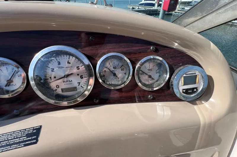 Slide: The Image of Dashboard of a 1996 Chaparral 196 SSi boat with gauges and controls. - 23