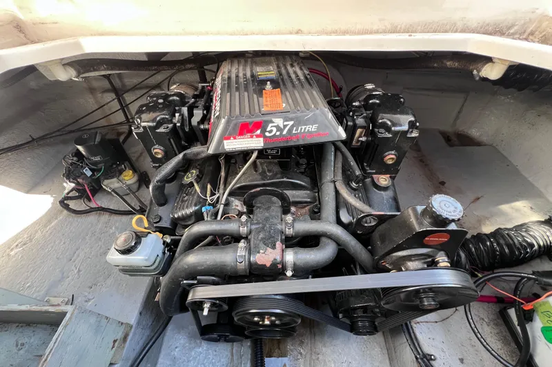 Slide: The Image of Engine compartment of a 1996 Chaparral 196 SSi boat with 5.7-liter motor. - 34