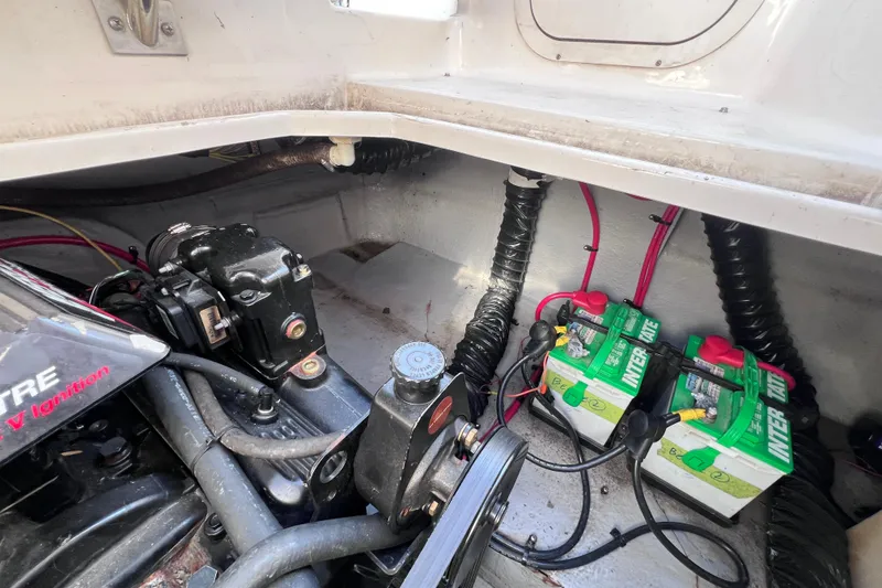 Slide: The Image of Engine compartment of a 1996 Chaparral 196 SSi with batteries and wiring visible. - 36