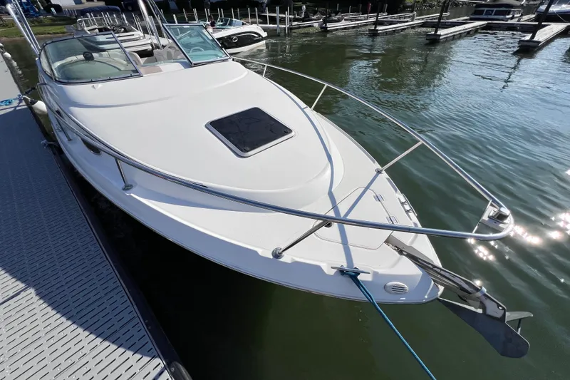 Slide: The Image of 1996 Chaparral 196 SSi boat docked at marina, viewed from the bow. - 9