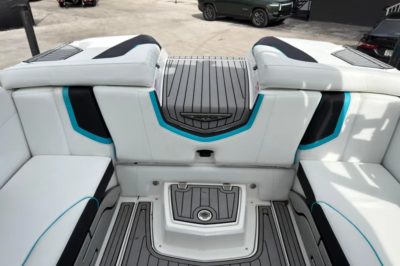 Slide: The Image of 2019 Nautique Super Air Nautique G23 Coastal Edition interior with sleek seating and modern design. - 21