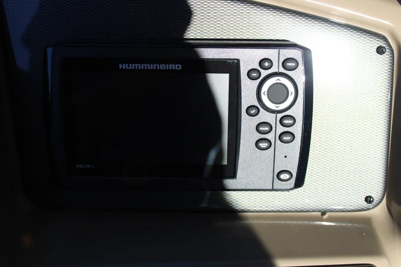 Slide: The Image of Humminbird Helix 5 fish finder on 2026 Starcraft EXS 3 Q boat dashboard. - 21