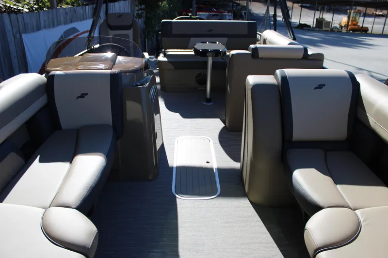 Slide: The Image of 2026 Starcraft EXS 3 Q boat interior with luxurious seating and modern design. - 33