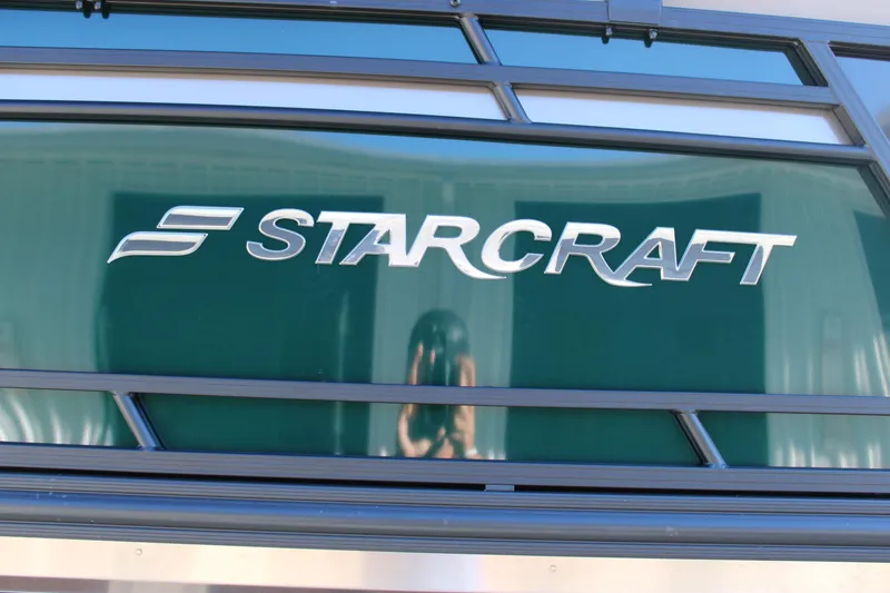 Slide: The Image of 2026 Starcraft EXS 3 Q logo on a sleek, modern surface. - 35