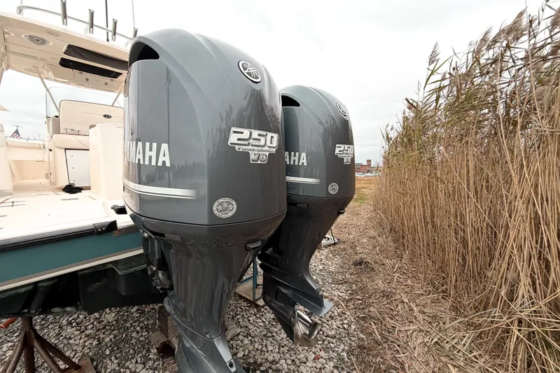 Slide: The Image of 2014 Pursuit S 280 Sport boat with twin Yamaha 250 outboard engines. - 2