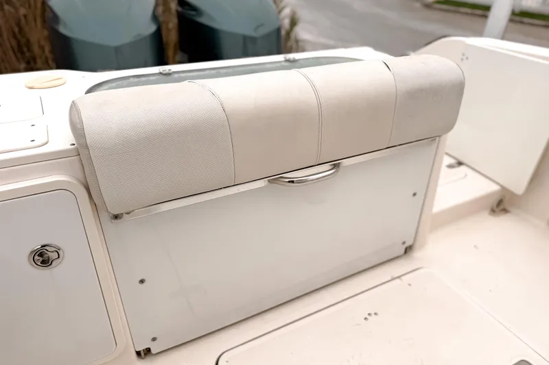 Slide: The Image of 2014 Pursuit S 280 Sport boat seat with storage compartment. - 5