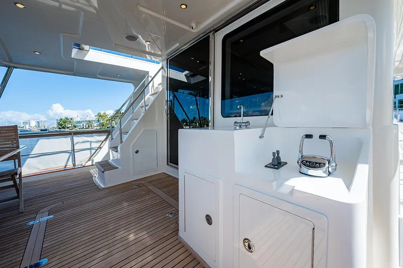 Slide: The Image of 2013 Grand Banks 54 Europa yacht deck with outdoor sink and seating area. - 10
