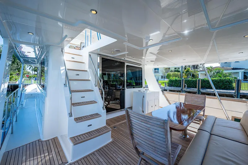 Slide: The Image of Luxurious 2013 Grand Banks 54 Europa yacht with elegant teak deck and spacious outdoor seating. - 15