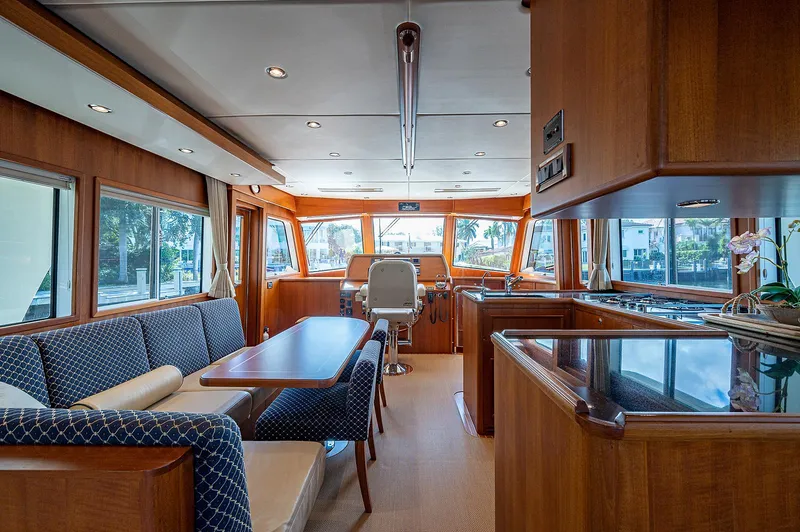 Slide: The Image of Luxurious interior of 2013 Grand Banks 54 Europa yacht with elegant wood finishes. - 2