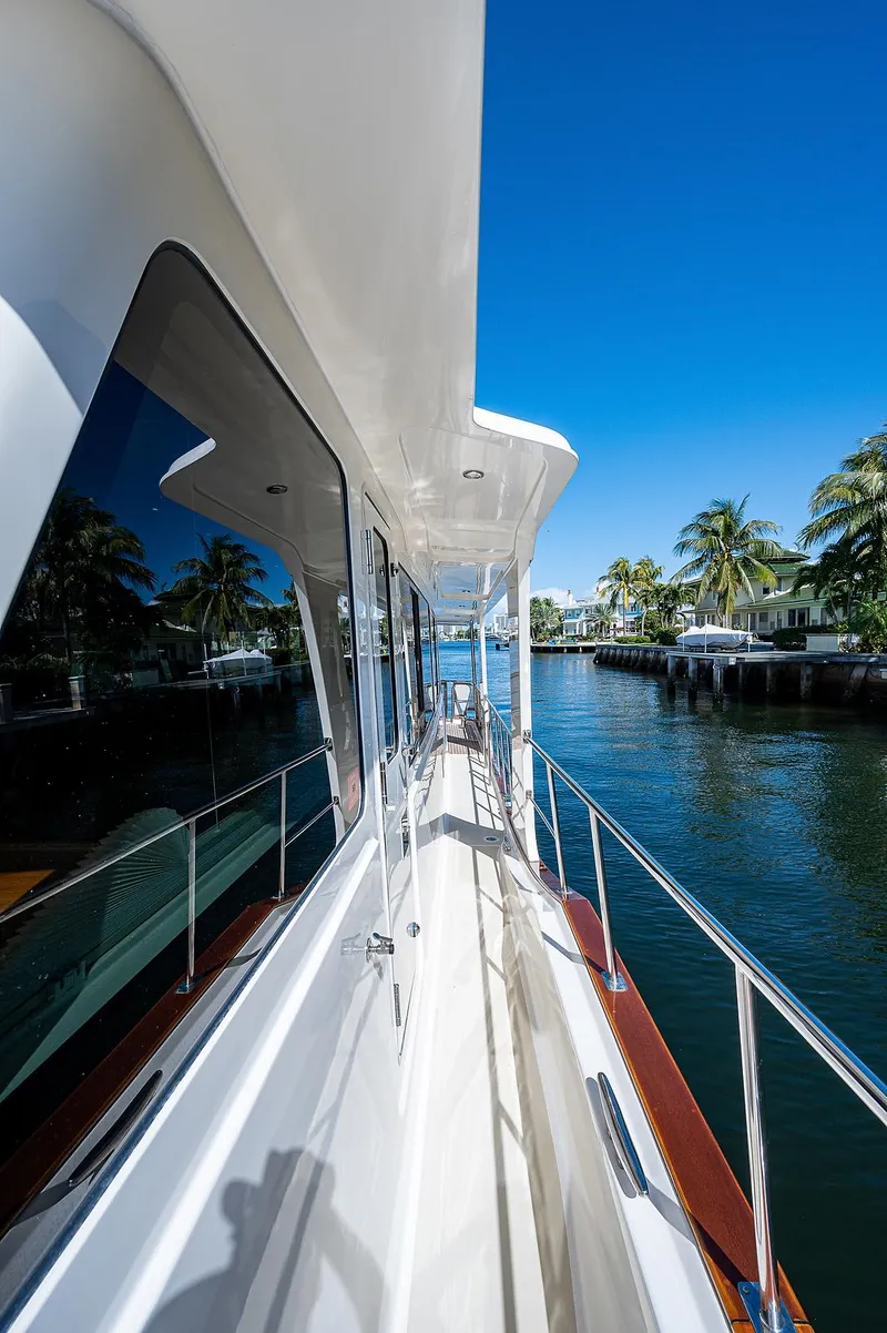 Slide: The Image of 2013 Grand Banks 54 Europa yacht docked by a tropical waterfront. - 20
