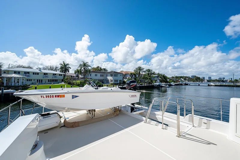 Slide: The Image of 2013 Grand Banks 54 Europa yacht deck with scenic waterfront view. - 43