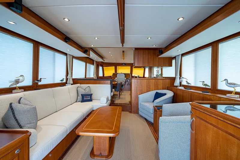 Slide: The Image of Luxurious interior of 2013 Grand Banks 54 Europa yacht with elegant wood finishes and comfortable seating. - 45