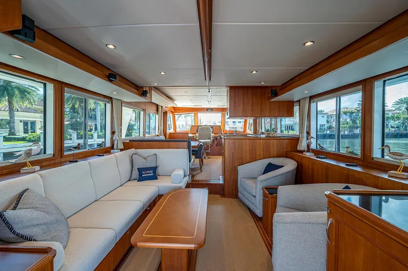 Slide: The Image of Luxurious interior of 2013 Grand Banks 54 Europa yacht with elegant wood finishes and spacious seating. - 46
