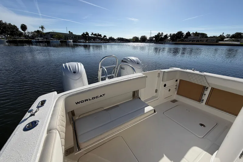 Slide: The Image of 2026 World Cat 280 CC-X boat interior with Yamaha engines on a sunny day. - 11