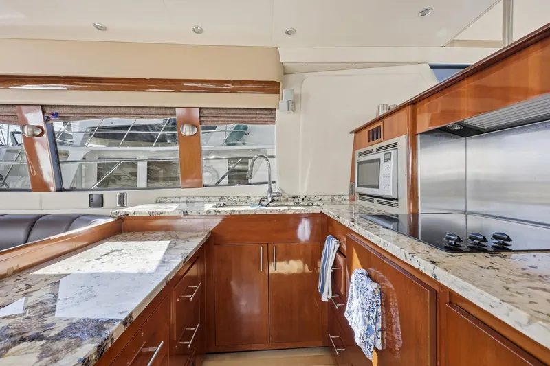 Slide: The Image of Luxurious kitchen interior of 2006 Carver 56 Voyager yacht with granite countertops. - 23