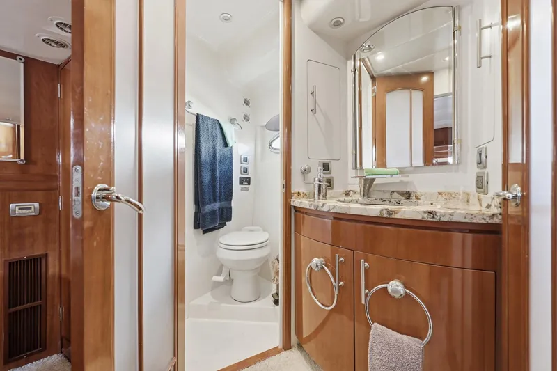 Slide: The Image of Luxurious bathroom in 2006 Carver 56 Voyager yacht with elegant wood cabinetry and modern fixtures. - 39