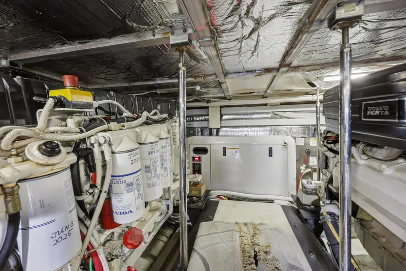 Slide: The Image of Engine room of a 2006 Carver 56 Voyager yacht with Volvo Penta components. - 56
