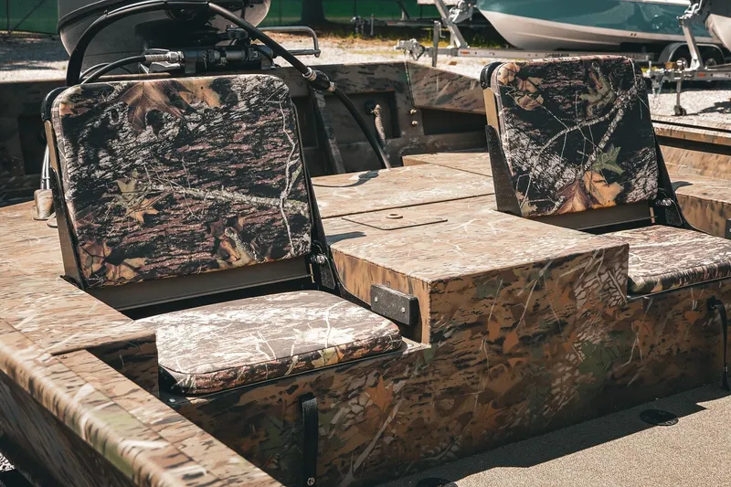 Slide: The Image of 2026 G3 Gator Tough 18 CCJ boat with camouflage seating and rugged design. - 13