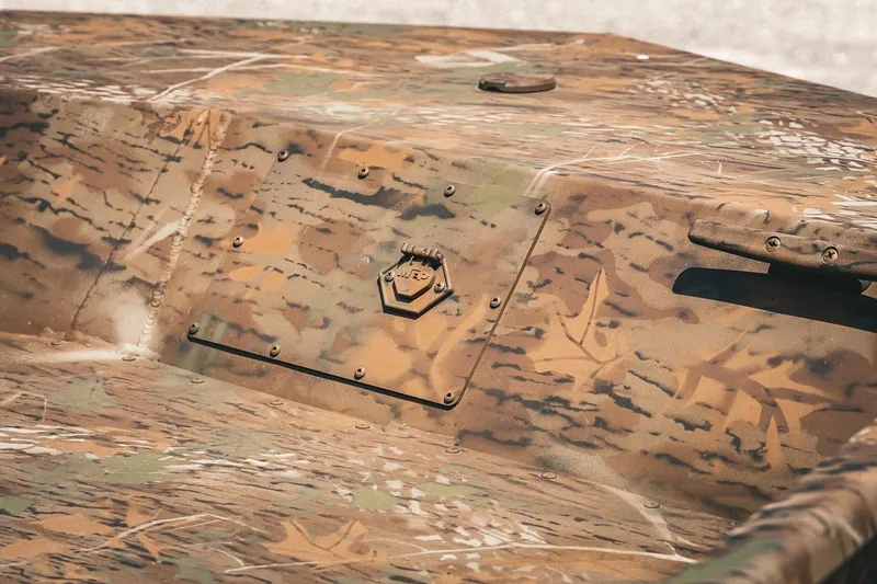 Slide: The Image of 2026 G3 Gator Tough 18 CCJ boat with camouflage pattern and rugged design. - 16