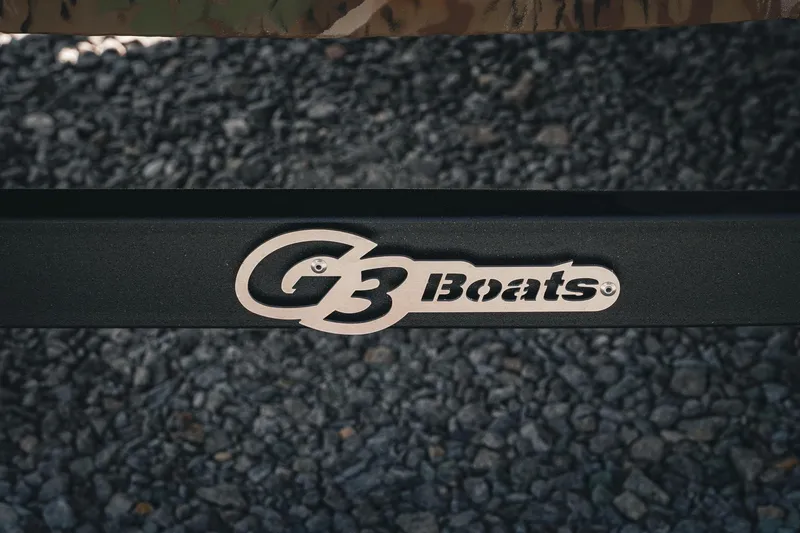 Slide: The Image of G3 Boats logo on 2026 Gator Tough 18 CCJ, gravel background. - 30