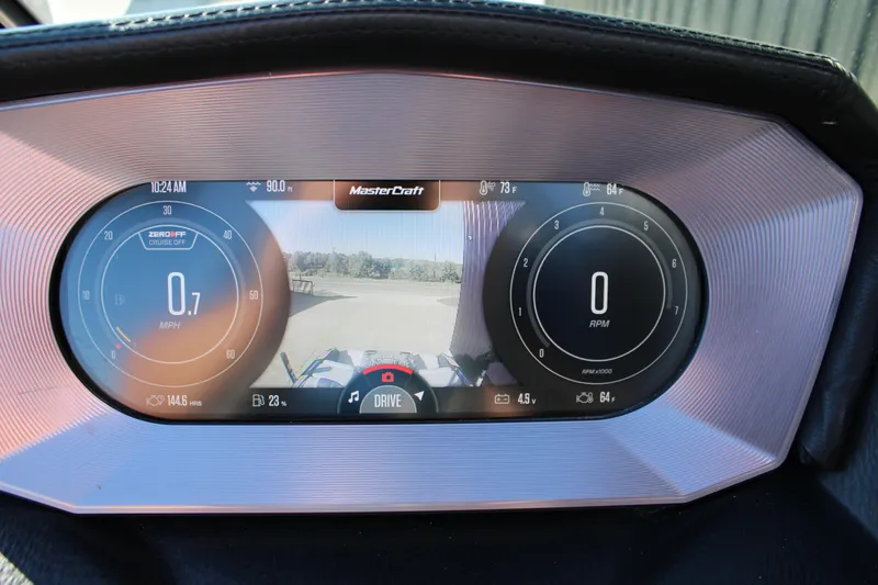 Slide: The Image of 2022 MasterCraft X24 dashboard display showing speed, RPM, and rearview camera. - 25