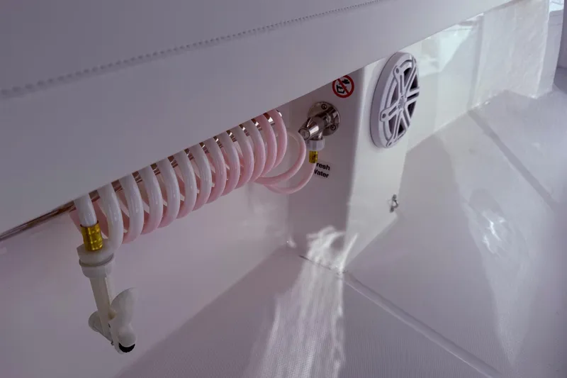 Slide: The Image of Freshwater hose and speaker on 2026 Regulator 28 boat. - 18