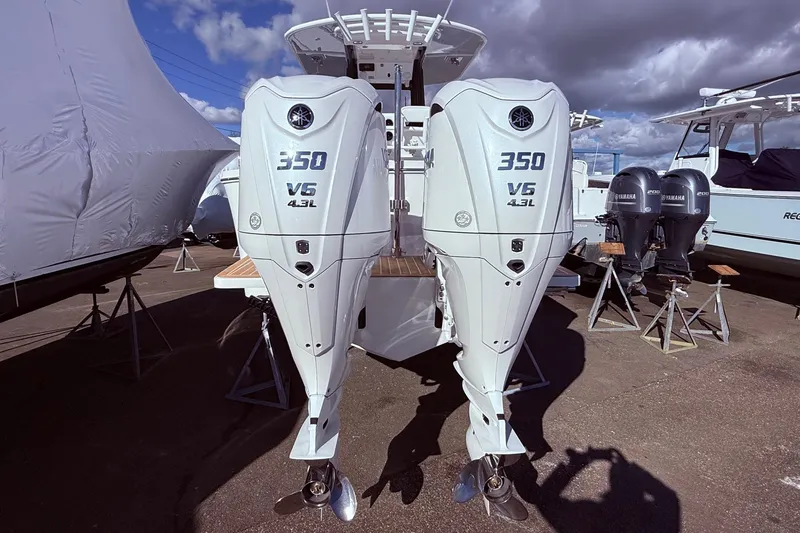 Slide: The Image of 2026 Regulator 28 boat with twin Yamaha 350 V6 outboard engines. - 9