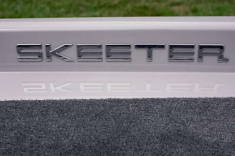 Slide: The Image of Skeeter ZXR20 SE 2026 logo on boat with carpeted surface. - 20