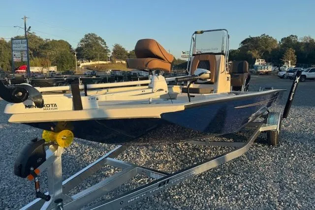 Slide: The Image of 2026 Xpress H20B Bay boat on trailer, featuring Minn Kota Maxxum motor. - 3