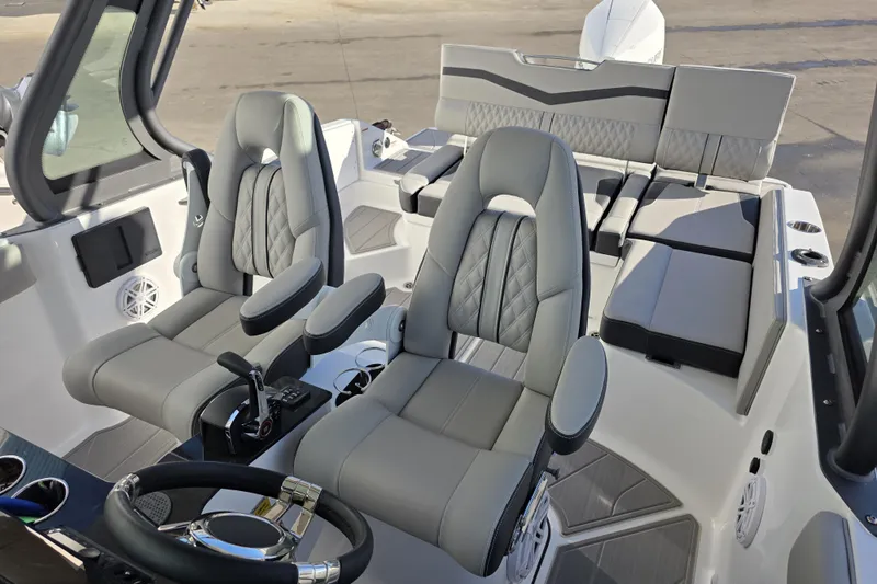 Slide: The Image of 2026 Monterey Elite 25 OB boat interior with luxurious seating and modern design. - 20